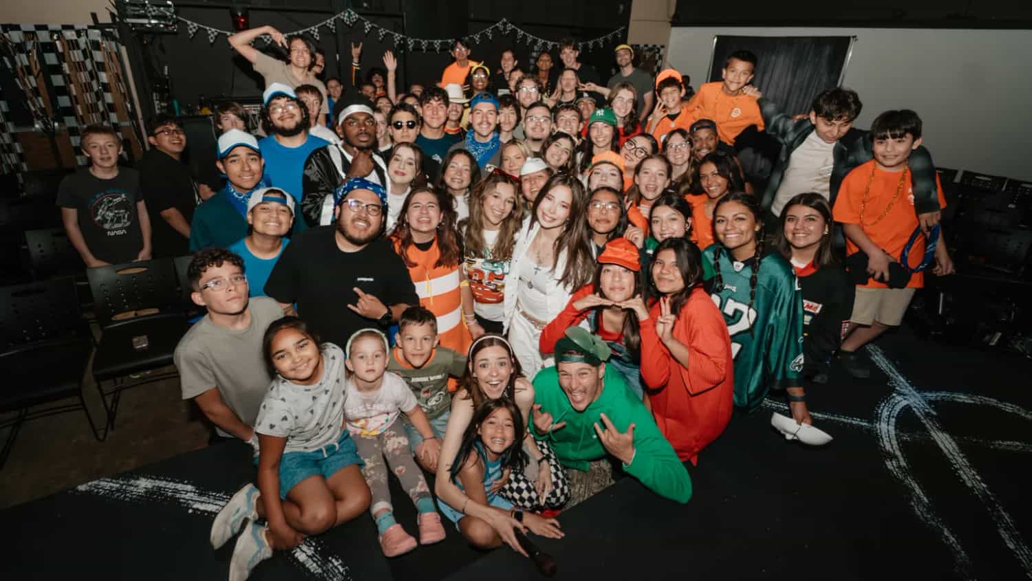 Children, teenagers, and serve team leaders posing together at BC Kids
