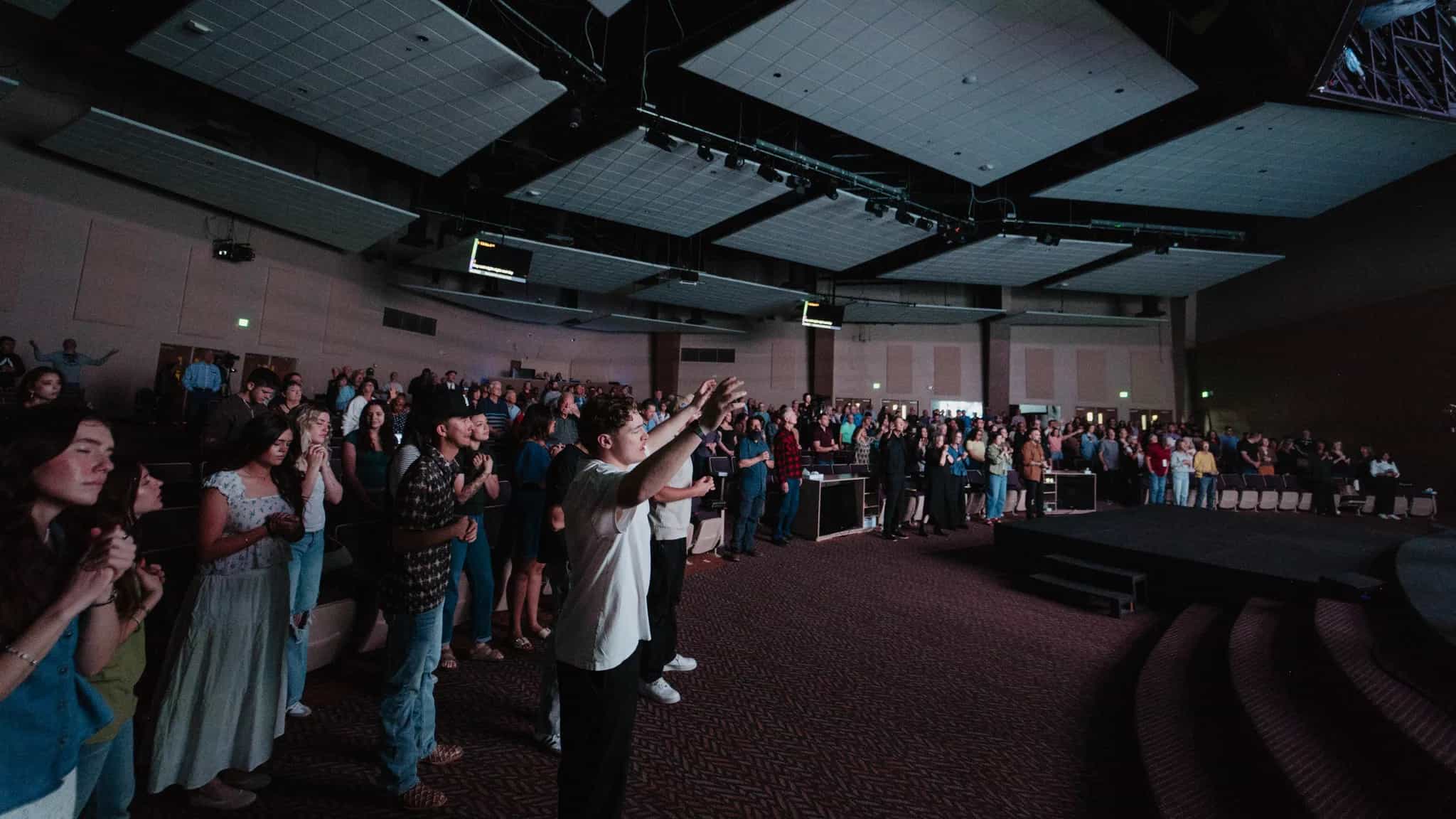 Congregation standing together during a church service
